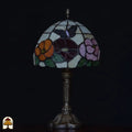 Tiffany tafellamp Papilio Reginae ⌀20 cm onverlicht – kleurrijke bloemen op crème kap, daglichtkleuren